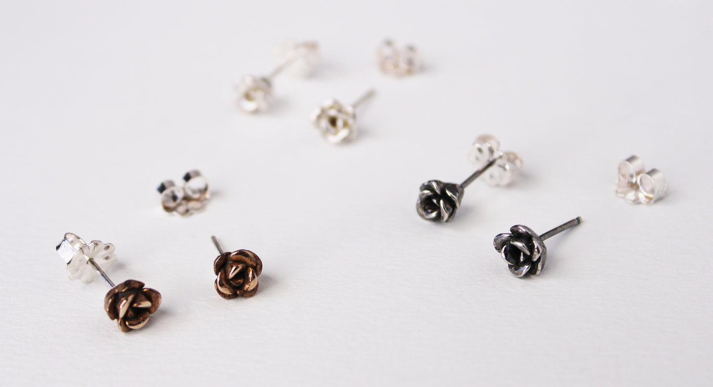 Earrings: rose studs: antique silver